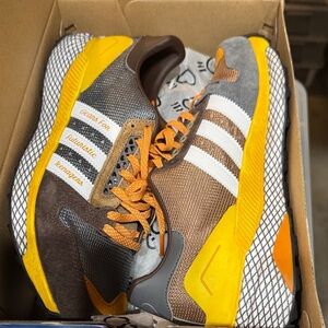 Adidas Sneakers with Yellow and Brown Highlights